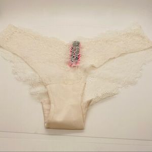 NWOT La Senza Lace Bikini Iridescent White. Size Small.